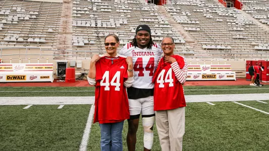 BLOOMINGTON, IN - October 06, 2022 - linebacker Aaron Casey #44 of the Indiana Hoosiers, Linda Taliaferro Harvey, Renee Taliaferro Buckner during practice at Memorial Stadium in Bloomington, IN. Photo By Rachel Gillam/Indiana Athletics