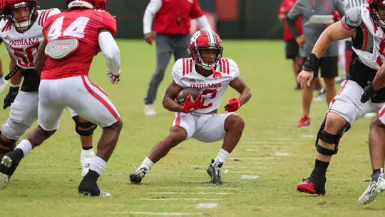 BLOOMINGTON, IN - August 15, 2023 - running back Jaylin Lucas #12 of the Indiana Hoosiers during Fall Camp Day 11 at Memorial Stadium in Bloomington, IN. Photo By Dalton Wainscott/Indiana Athletics