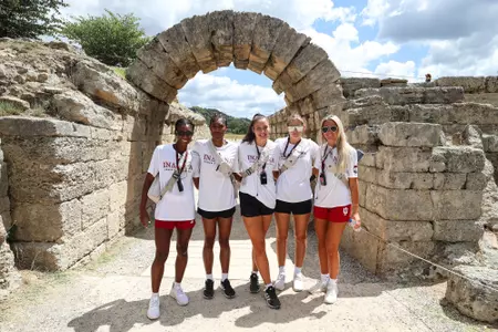 BLOOMINGTON, IN - August 06, 2023 - guard Chloe Moore-McNeil #22 of the Indiana Hoosiers, forward Sharnecce Currie-Jelks #23 of the Indiana Hoosiers, forward Mackenzie Holmes #54 of the Indiana Hoosiers, forward Lilly Meister #52 of the Indiana Hoosiers, guard Sydney Parrish #33 of the Indiana Hoosiers at archaeological site of Olympia in Olympia, Greece. Photo By Rachel Gillam/Indiana Athletics