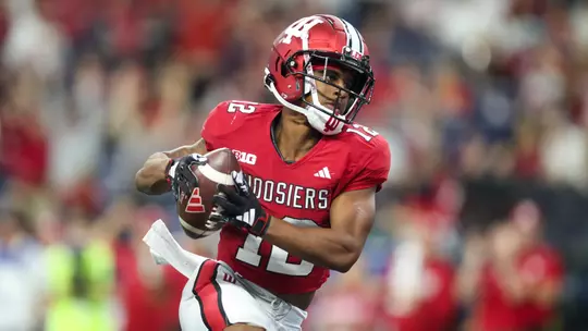 INDIANAPOLIS, IN - September 16, 2023 - running back Jaylin Lucas #12 of the Indiana Hoosiers during the game between the Louisville Cardinals and the Indiana Hoosiers at Lucas Oil Stadium in Indianapolis, IN. Photo By Sammy Nance/Indiana Athletics
