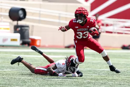 BLOOMINGTON, IN - August 19, 2023 - running back David Holloman #33 of the Indiana Hoosiers during Fall Camp at John Mellencamp Pavillion in Bloomington, IN. Photo By Andrew Mascharka/Indiana Athletics