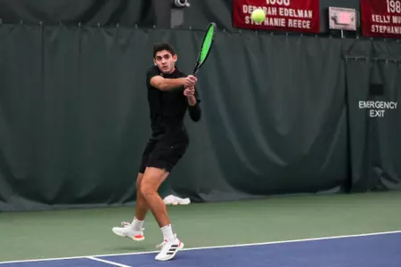 BLOOMINGTON, IN - JANUARY 29, 2023 - Sam Landau during the match between the Butler Bulldogs and the Indiana Hoosiers at Indiana University Tennis Center in Bloomington, IN. Photo By Pearson Georges/Indiana Athletics