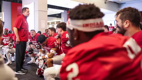 BLOOMINGTON, IN - October 19, 2024 - Indiana Hoosiers Head Coach Curt Cignetti and the Indiana Hoosiers Football team during the game between the Indiana Hoosiers and the Nebraska Cornhuskers at Memorial Stadium in Bloomington, Indiana. Photo By Trent Barnhart/Indiana Athletics