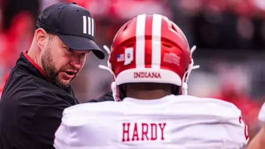 COLUMBUS, OH - November 23, 2024 - Indiana Hoosiers Defensive Coordinator and Linebackers Coach Bryant Haines and linebacker Rolijah Hardy #21 of the Indiana Hoosier during the game between the Ohio State Buckeyes and the Indiana Hoosiers at Ohio Stadium in Columbus, Ohio. Photo By Trent Barnhart/Indiana Athletics