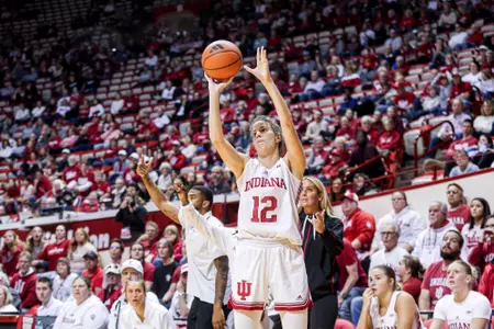 BLOOMINGTON, IN - December 4, 2024 - guard Yarden Garzon #12 of the Indiana Hoosiers during the game between the Southern Indiana Screaming Eagles and the Indiana Hoosiers at Simon Skjodt Assembly Hall in Bloomington, IN. Photo By Indiana Athletics