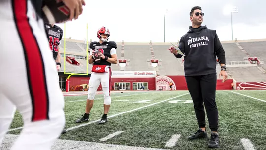 BLOOMINGTON, IN - March 26, 2024 - Indiana Hoosiers Co-Offensive Coordinator and Quarterbacks Coach Tino Sunseri during practice at Memorial Stadium in Bloomington, IN. Photo By Andrew Mascharka/Indiana Athletics