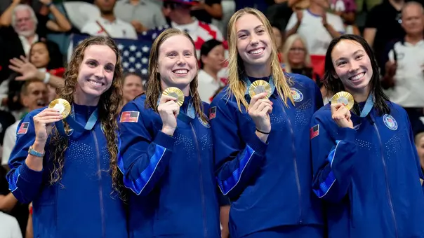 Aug 4, 2024; Nanterre, France; Regan Smith (USA) Lilly King (USA), Gretchen Walsh (USA) and Torri Huske (USA) in the women’s 4 x 100-meter medley relay medal ceremony during the Paris 2024 Olympic Summer Games at Paris La Défense Arena. Mandatory Credit: Grace Hollars-USA TODAY Sports