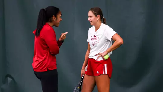 BLOOMINGTON, IN - September 11, 2024 - Head Coach Gabrielle Moore and Nicole Teodosescu of the Indiana Hoosiers during practice at IU Tennis Center in Bloomington, IN. Photo By Maddi Sponsel/Indiana Athletics