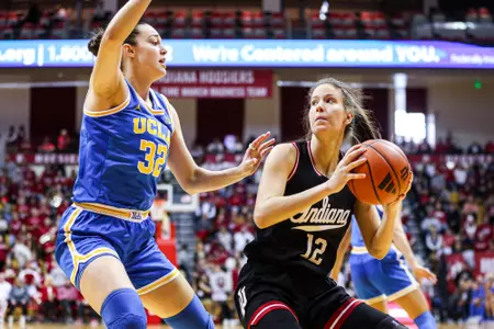 BLOOMINGTON, IN - January 4, 2025 - guard Yarden Garzon #12 of the Indiana Hoosiers during the game between the University of California Los Angeles Bruins and the Indiana Hoosiers at Simon Skjodt Assembly Hall in Bloomington, IN. Photo By Indiana Athletics