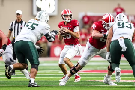 BLOOMINGTON, IN - October 18, 2025 - quarterback Fernando Mendoza #15 of the Indiana Hoosiers during the game between the Michigan State Spartans and the Indiana Hoosiers at Merchants Bank Field at Memorial Stadium in Bloomington, IN. Photo By Indiana Athletics