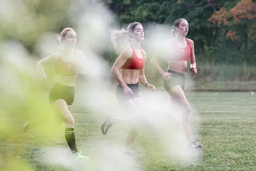 BLOOMINGTON, IN - September 18, 2025 - Joey Rastrelli of the Indiana Hoosiers; Katelyn Winton of the Indiana Hoosiers; Ava Jarrell of the Indiana Hoosiers during practice at IU Championship Cross County Course in Bloomington, IN. Photo By Spencer Meyer/Indiana Athletics