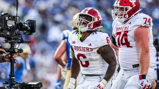 PASADENA, CA - September 14, 2024 - running back Justice Ellison #6 of the Indiana Hoosiers and offensive lineman Bray Lynch #74 of the Indiana Hoosiers during the game between the UCLA Bruins and the Indiana Hoosiers at the Rose Bowl Stadium in Pasadena, California. Photo By Trent Barnhart/Indiana Athletics