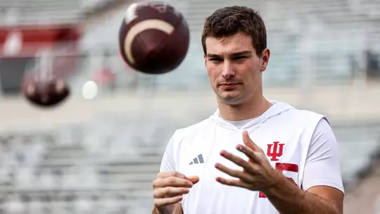 BLOOMINGTON, IN - November 15, 2025 - quarterback Fernando Mendoza #15 of the Indiana Hoosiers during the game between the Wisconsin Badgers and the Indiana Hoosiers at Merchants Bank Field at Memorial Stadium in Bloomington, IN. Photo By Grace Urbanski/Indiana Athletics