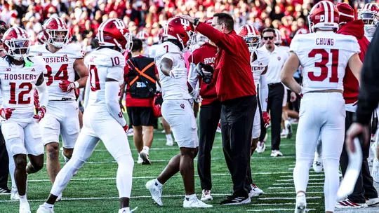 COLLEGE PARK, MD - November 01, 2025 - defensive back Louis Moore #7 of the Indiana Hoosiers and Indiana Hoosiers Head Coach Curt Cignetti during the game between the Maryland Terrapins and the Indiana Hoosiers at SECU Stadium in College Park, MD. Photo By Dani Meersman/Indiana Athletics