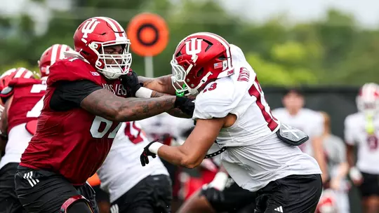 BLOOMINGTON, IN - August 12, 2025 - offensive lineman Kahlil Benson #67 of the Indiana Hoosiers and defensive lineman Kellan Wyatt #13 of the Indiana Hoosiers during Fall Camp at John Mellencamp Pavillion in Bloomington, IN. Photo By Dani Meersman/Indiana Athletics