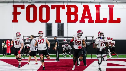 BLOOMINGTON, IN - March 28, 2026 - defensive lineman Blake Smythe #91 of the Indiana Hoosiers and defensive lineman Mario Landino #97 of the Indiana Hoosiers and defensive lineman Tyrone Burrus Jr. #99 of the Indiana Hoosiers and defensive lineman Daniel Ndukwe #17 of the Indiana Hoosiers during spring practice at John Mellencamp Pavillion in Bloomington, IN Photo By Luke Miller/Indiana Athletics