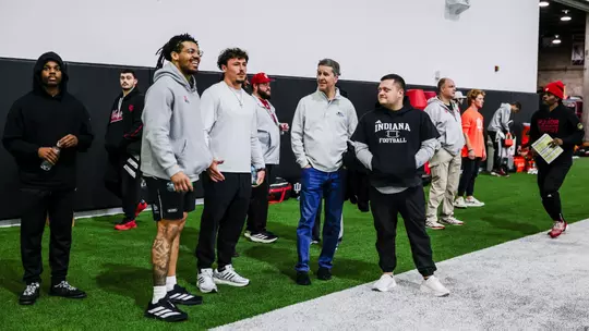 BLOOMINGTON, IN - March 28, 2026 - Indiana Hoosiers Vice President and Director of Athletics Scott Dolson and Riley Nowakowski and Aiden Fisher during spring practice at John Mellencamp Pavillion in Bloomington, IN Photo By Luke Miller/Indiana Athletics
