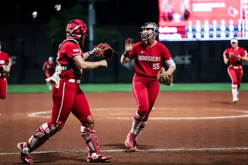 BLOOMINGTON, IN - April 15, 2026 - catcher\utility Avery Parker #18 of the Indiana Hoosiers and pitcher Taylor Hess #55 of the Indiana Hoosiers during the game between the Louisville Cardinals and the Indiana Hoosiers at Don Dobina Field at Ulmer Stadium. Photo By Emma Pearce/Indiana Athletics