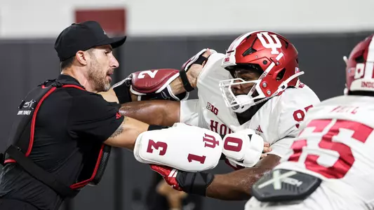 BLOOMINGTON, IN - April 04, 2026 - Indiana Hoosiers Defensive Tackles Coach Pat Kuntz and defensive lineman Tyrique Tucker #95 of the Indiana Hoosiers during practice at Mellencamp Pavillion in Bloomington, IN. Photo By Dani Meersman/Indiana Athletics