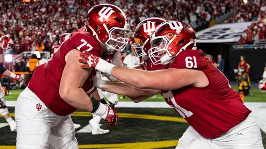 MIAMI, FL - January 19, 2026 - offensive lineman Matt Marek #77 of the Indiana Hoosiers and offensive lineman Baylor Wilkin #61 of the Indiana Hoosiers before the National Championship game against the Miami Hurricanes and the Indiana Hoosiers at Hard Rock Stadium in Miami, FL. Photo By Dani Meersman/Indiana Athletics