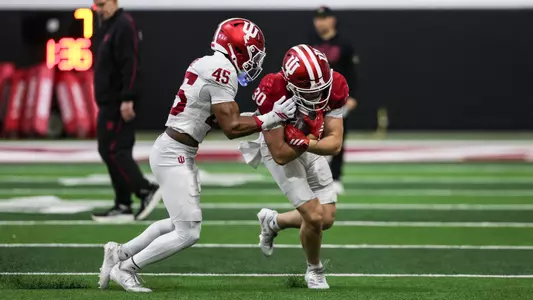 BLOOMINGTON, IN - April 18, 2026 - rdefensive back Lincoln Murff #45 of the Indiana Hoosiers and running back Kyler Kropp #30 of the Indiana Hoosiers during practice at Mellencamp Pavilion in Bloomington, IN. Photo By Dani Meersman/Indiana Athletics