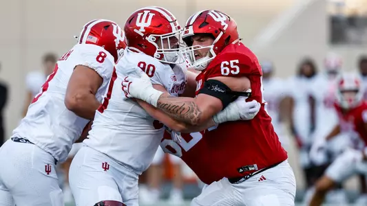 BLOOMINGTON, IN - August 25, 2026 - defensive lineman Joe Hjelle #90 of the Indiana Hoosiers and offensive lineman Carter Smith #65 of the Indiana Hoosiers during practice at Merchants Bank Field at Memorial Stadium in Bloomington, IN. Photo By Dani Meersman/Indiana Athletics