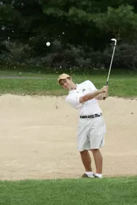 Joe Scheffres hitting from sand