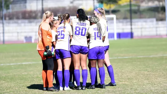 Group huddle women's soccer