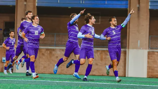 Team Celebrating in Pitt