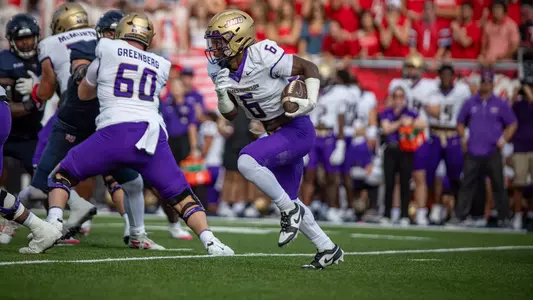 George Pettaway running in stride during a rush at Liberty.
