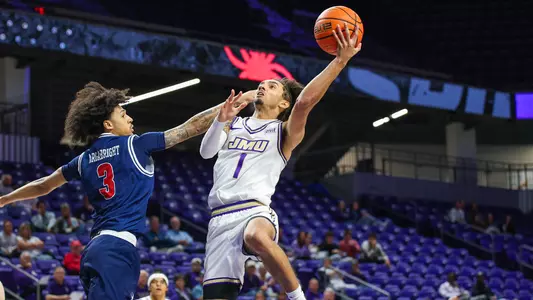 Paul Jones III puts up a layup during JMU's exhibition against Richmond