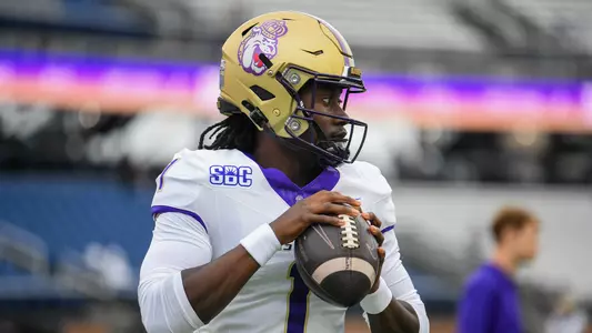 JC Evans makes a pass pregame against Georgia Southern