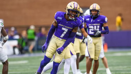 Roddrey Mcwilliams celebrates after making a tackle against MArshall