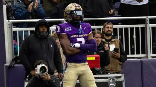 Corey Scott celebrates after socring a touchdown against Marshall