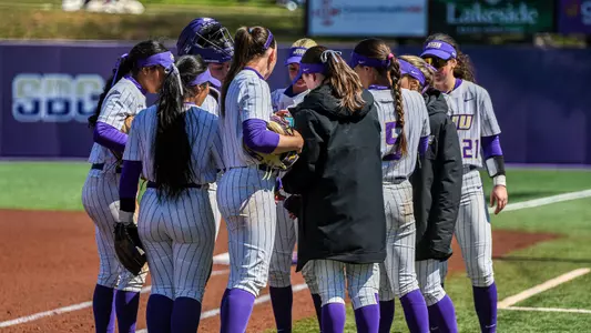 Softball team huddle