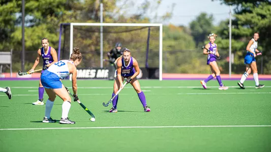 Julie Narleski in a defensive stance during a free hit for Duke at the JMU Field Hockey Complex