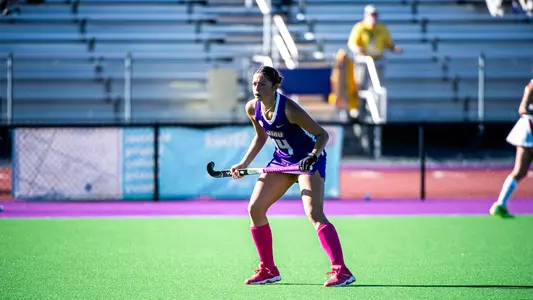 Sydney Raguini playing patrolling the midfield on defense against Massachusetts at the JMU Field Hockey Complex