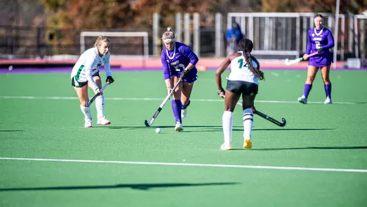Jola Ollrogge dribbling upfield versus Ohio at the JMU Field Hockey Complex