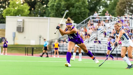 Skyler Brown winds up for a shot against Longwood at the JMU Field Hockey Complex