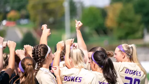 JMU Womens Soccer huddle during its game against Georgia Southern