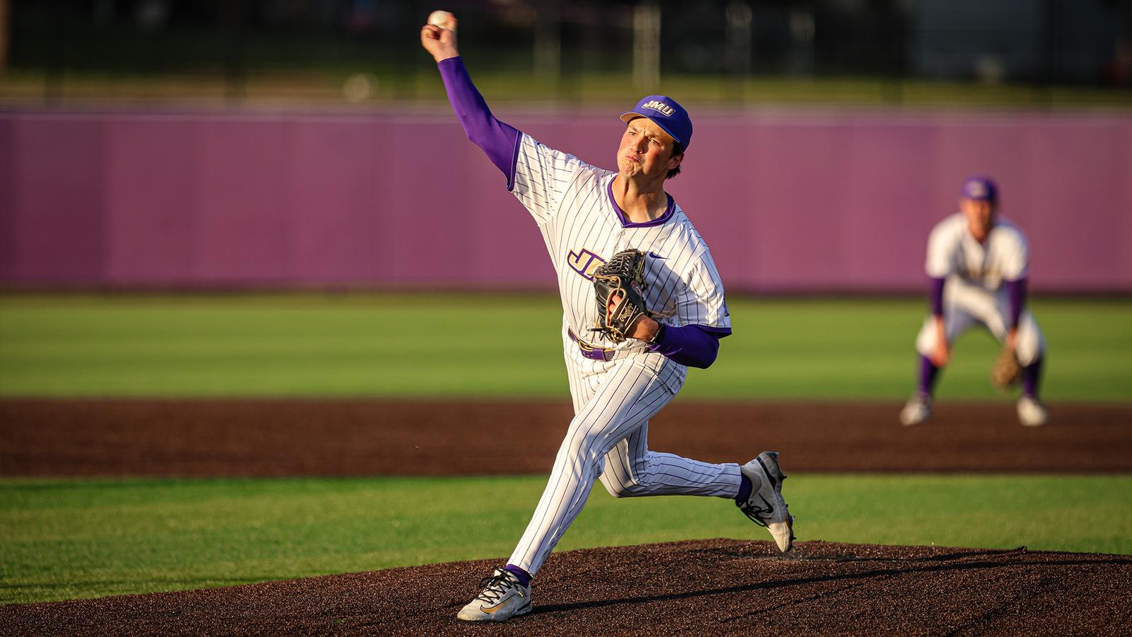 Holden McKinney throws a pitch against a Marshall batter.