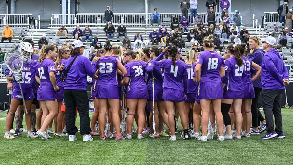 JMU huddles as a team during its NCAA Second Round matchup at top-seeded Northwestern