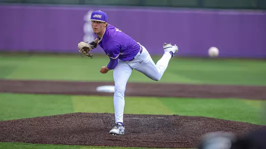 Tyler Lutz finishes throwing a pitch against Southern Miss.