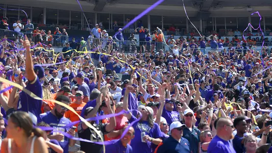 JMU fans celebrate at Virginia during the Dukes' 36-35 win in Charlottesville in 2023