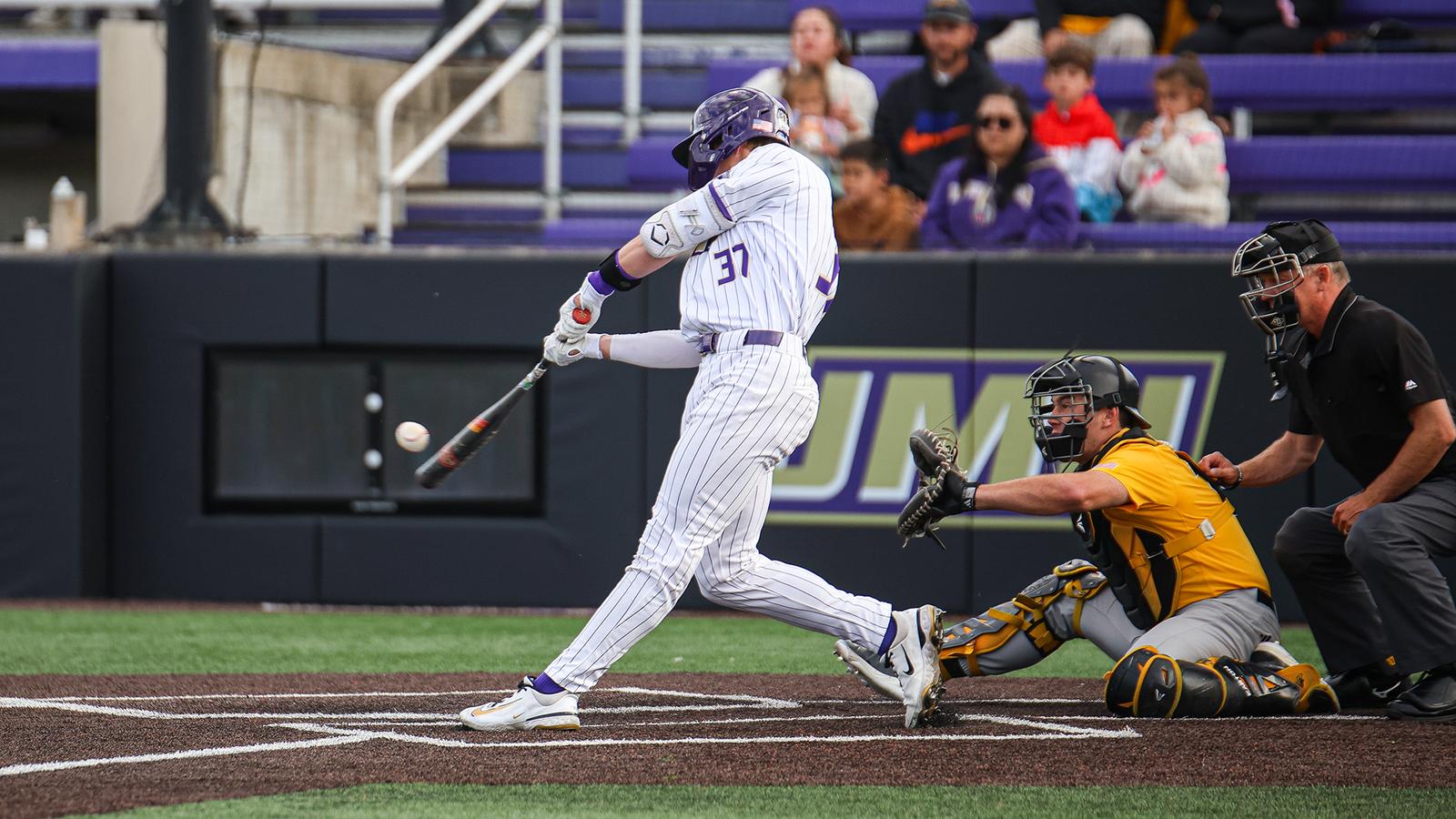 Ike Schmidly connecting with a ball on a swing during a game against Southern Miss.