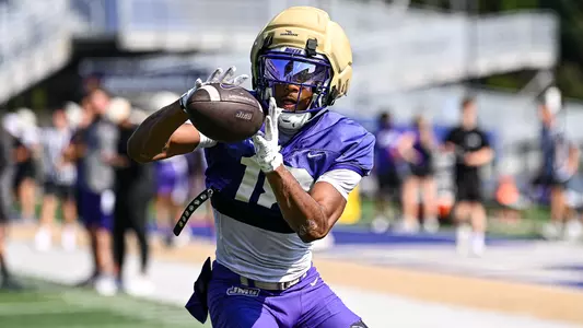 Kylan Billiot makes a catch during a JMU football practice