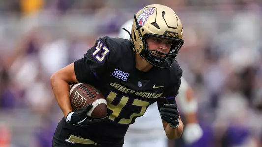 Mile Halbert makes a run after catching a pass against Wagner