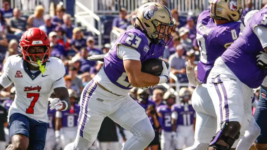 Nick Herman takes a handoff against Liberty