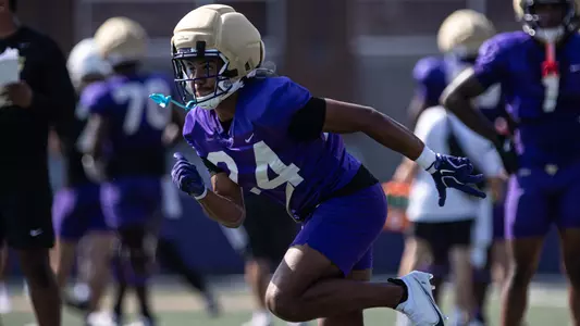 Kaleb Smith runs a route during a JMU football practice