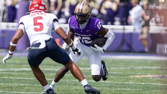 Za'Ron Collins jukes a Liberty defender after making a catch